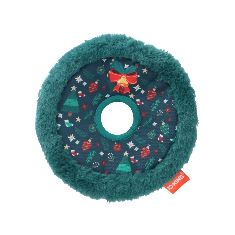 A Christmas Wreath-Inspired Doggy Plush Toy, Adorned With Festive Decorations, Brings Joy And Warmth, Evoking The Holiday Spirit And Your Dog's Cuteness.
